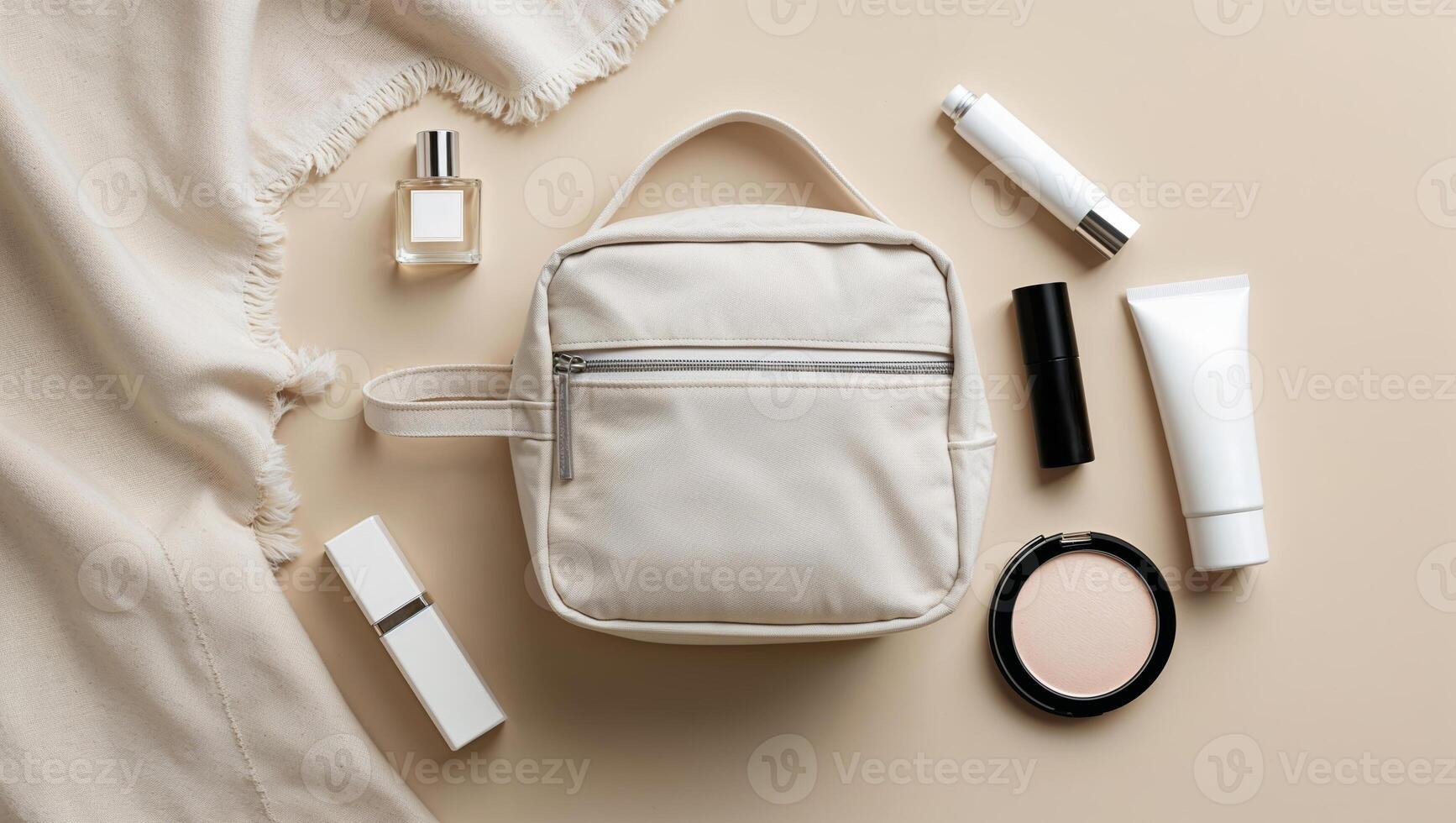 Stylish and organized cosmetic bag with beauty products arranged on a soft surface photo