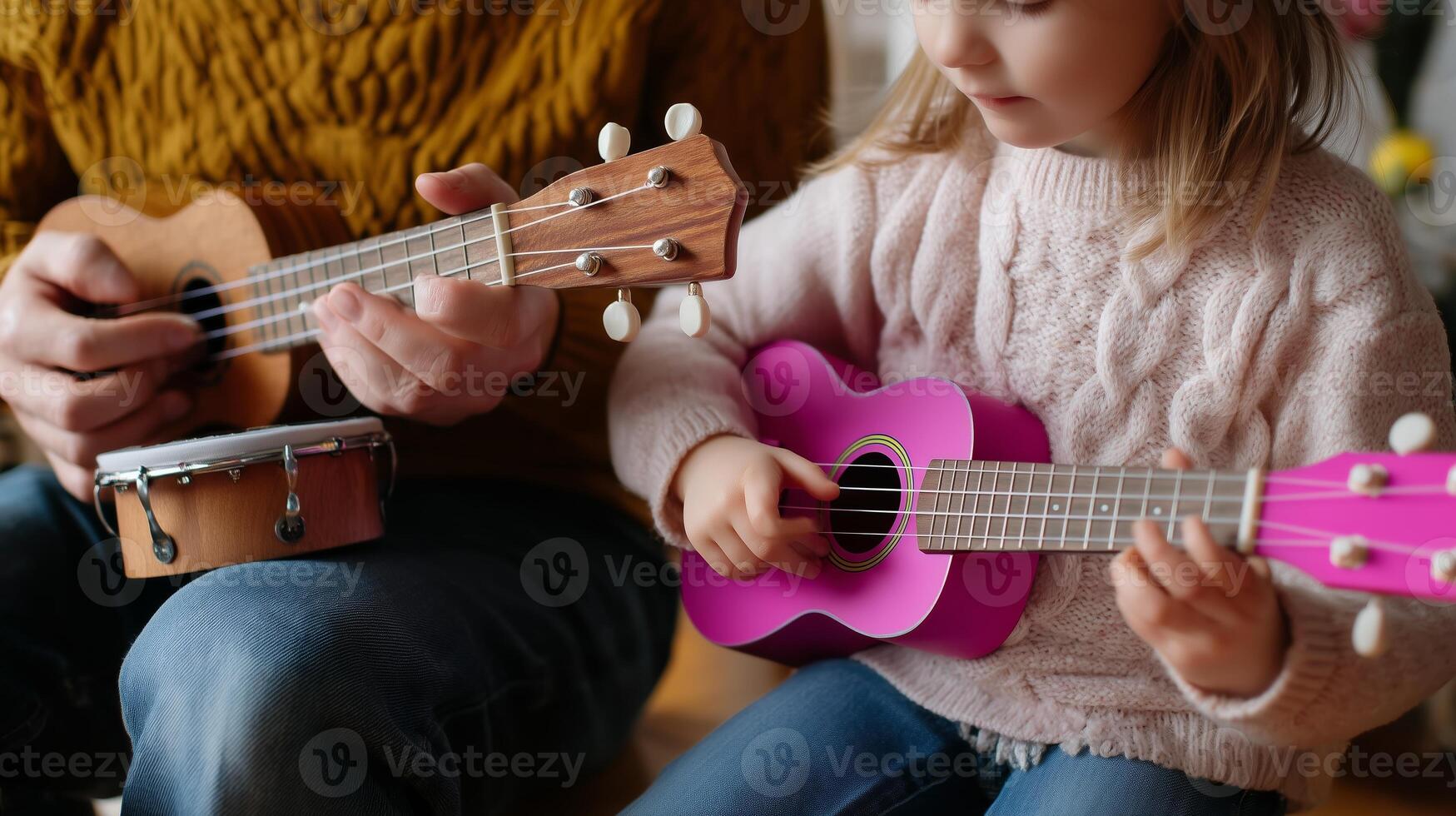 Family bonding through music as child learns to play ukulele with parent at home in cozy setting photo
