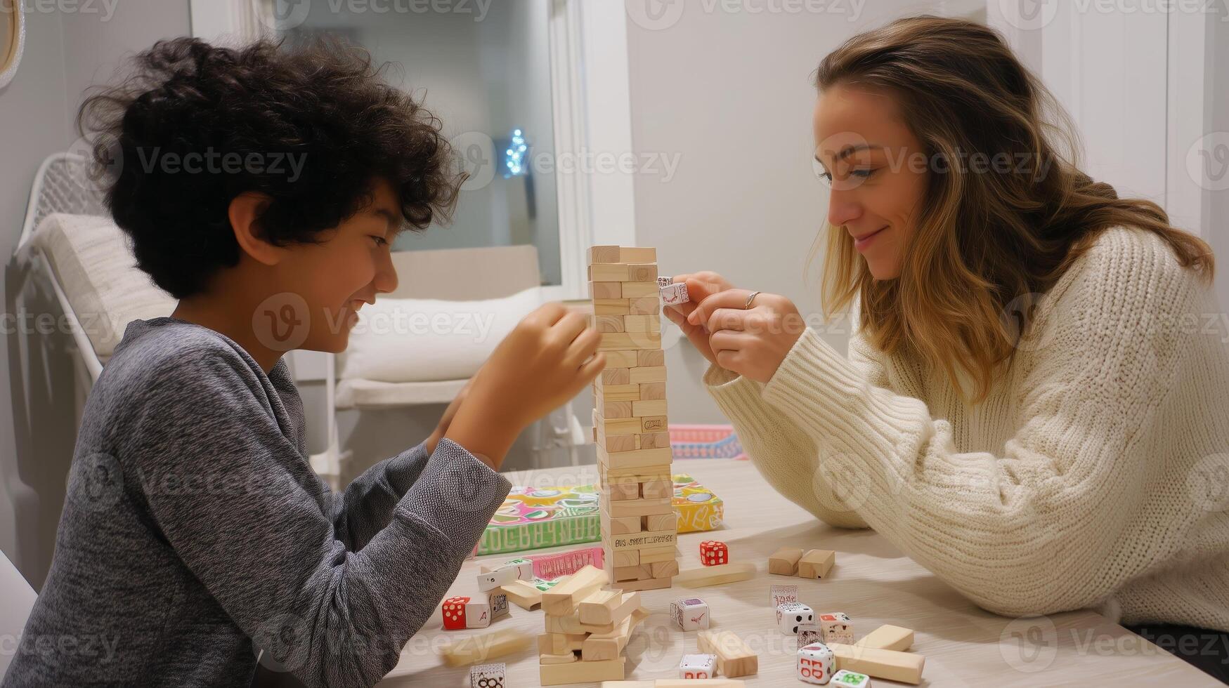 Family bonding time during a fun game of stacking blocks at home in the evening photo