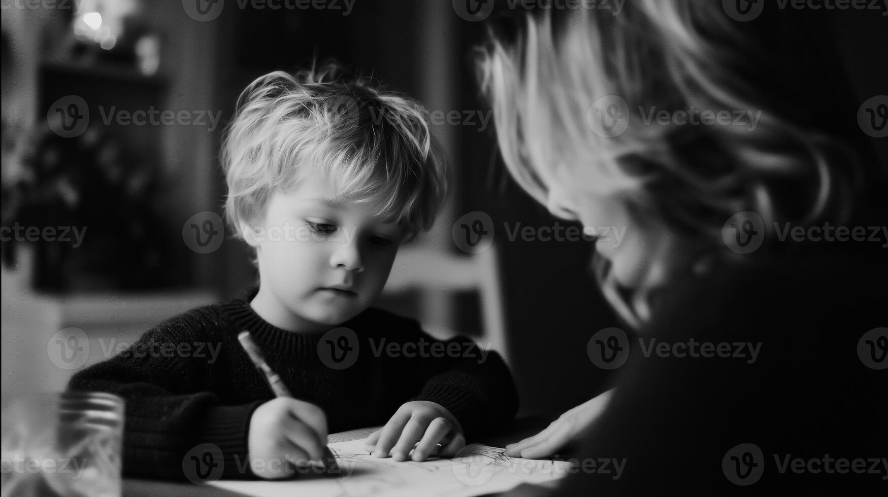 Mother and child engaged in creative drawing activity at home in cozy atmosphere during afternoon hours photo