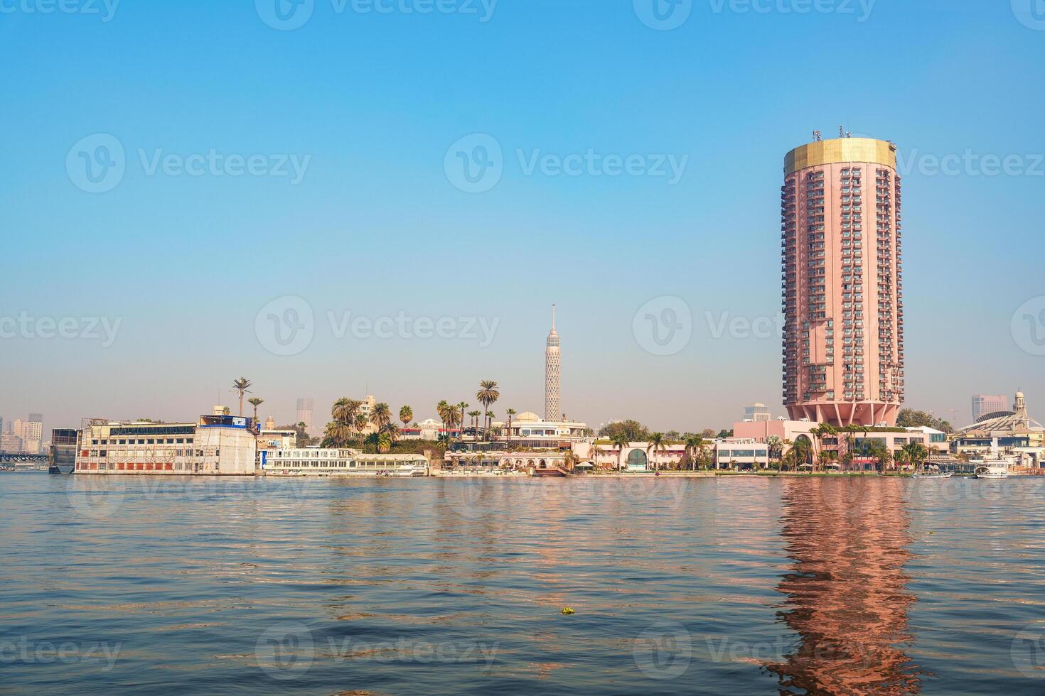 Cairo skyline with the Nile River and iconic architecture during a sunny daytime photo