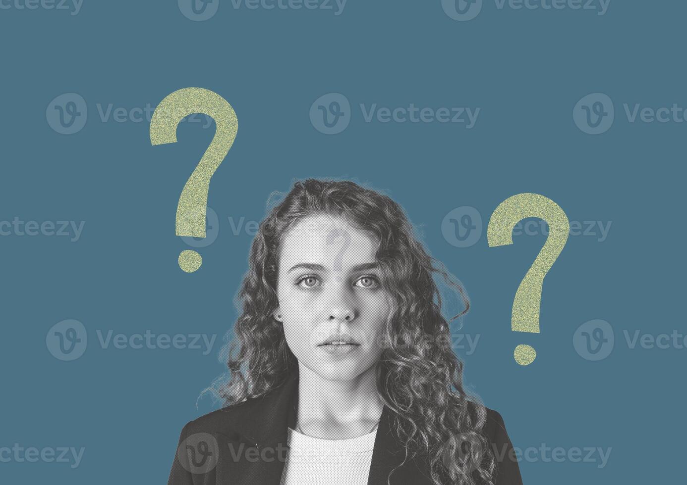 Confused young woman in smart attire with questioning expression on blue background photo