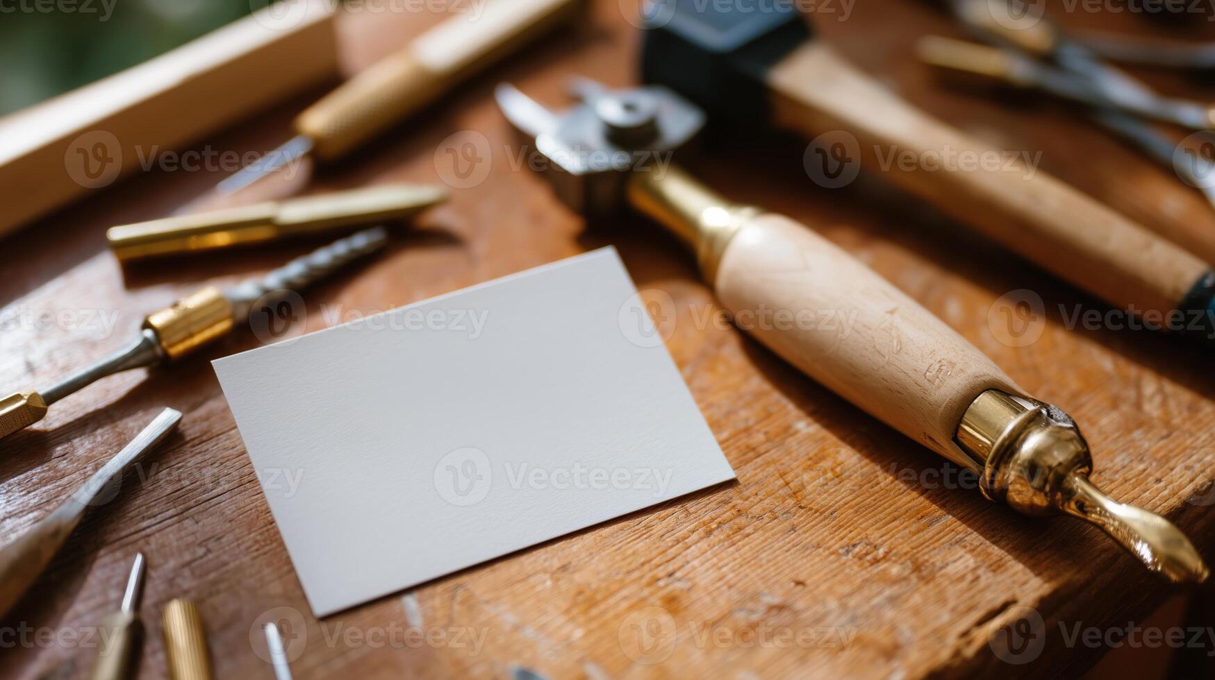 Creative woodworking setup showcasing tools and a blank card on a rustic wooden workbench photo