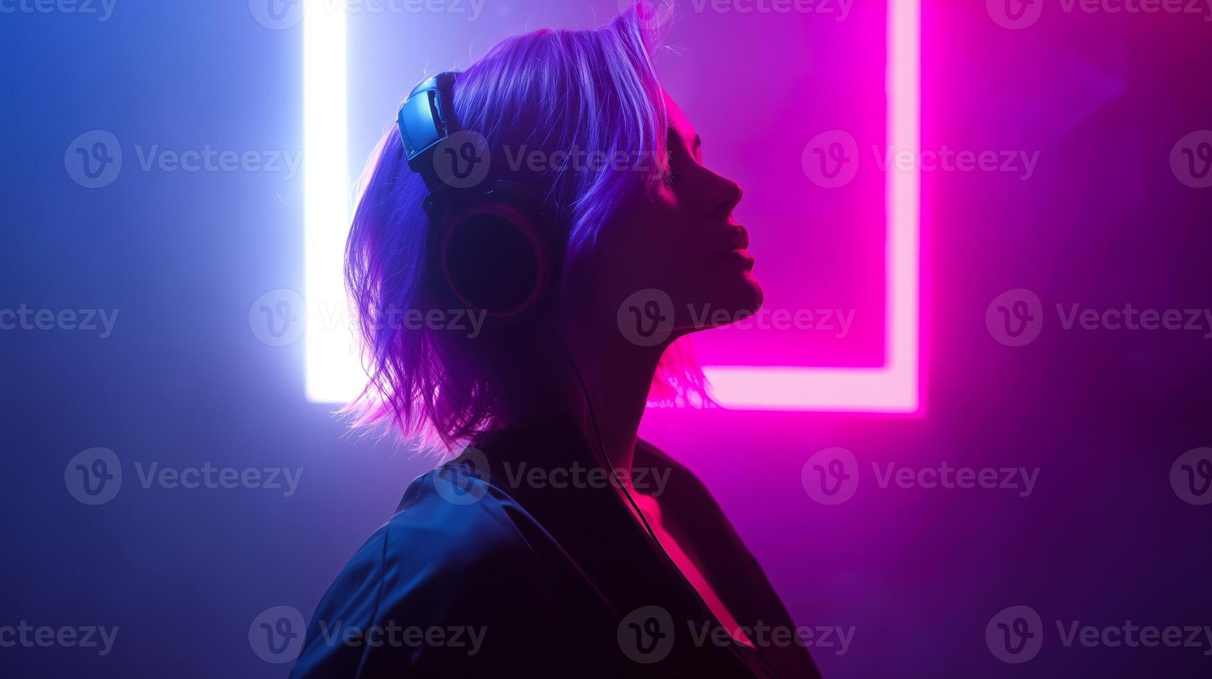 Young woman with pink hair enjoys music under vibrant neon lights at a lively urban party atmosphere photo