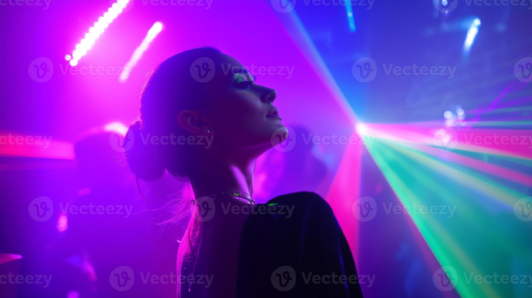 Bright lights and vibrant colors create an energetic atmosphere during nightlife at a club event photo