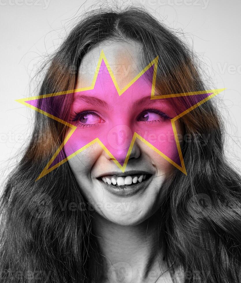 Creative portrait of a young woman with abstract star overlay in a studio setting during the day photo