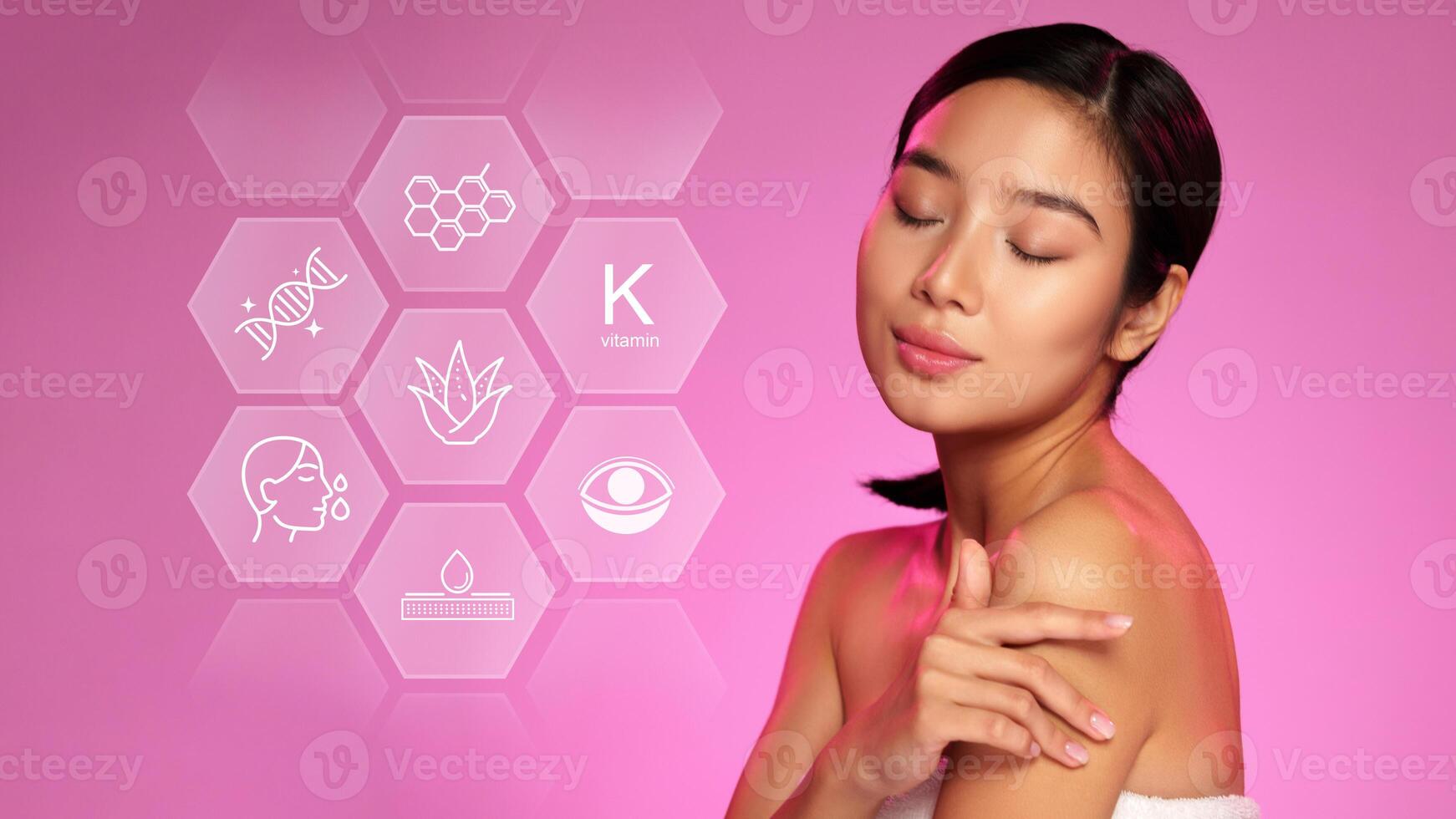 Exploring skincare benefits with glowing beauty in a vibrant pink backdrop photo