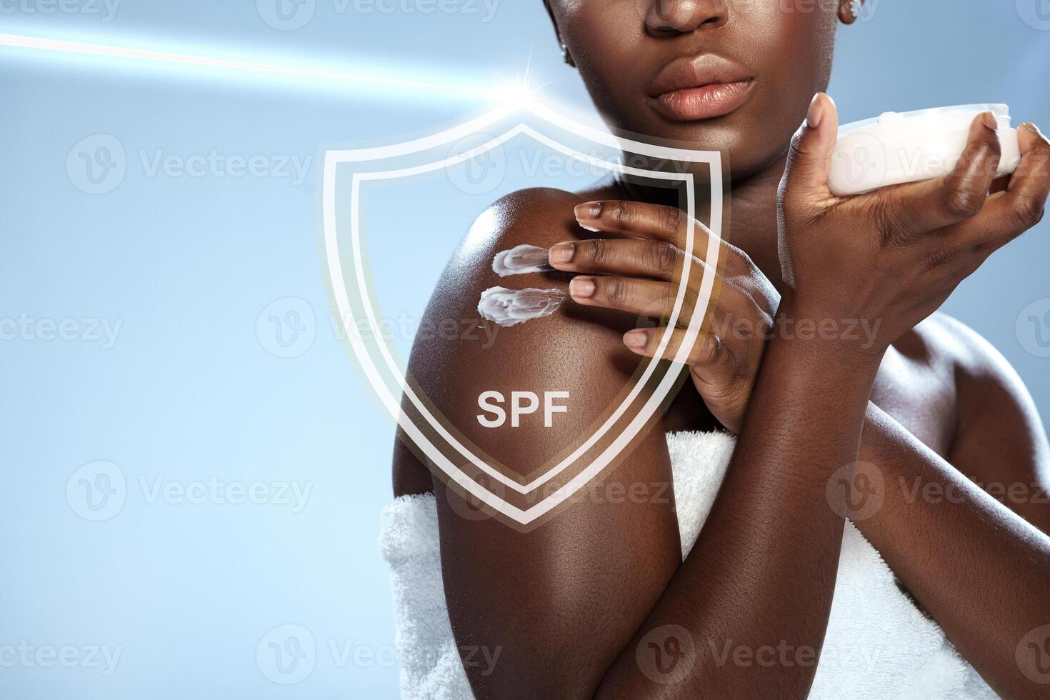 Applying sunscreen for skin protection against sunlight during a skincare routine at home photo
