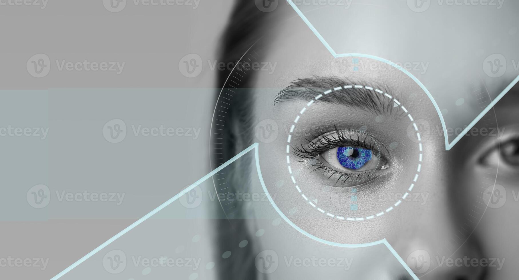 Close-up view of a human eye with a futuristic digital overlay showcasing intricate details and vibrant blue iris photo