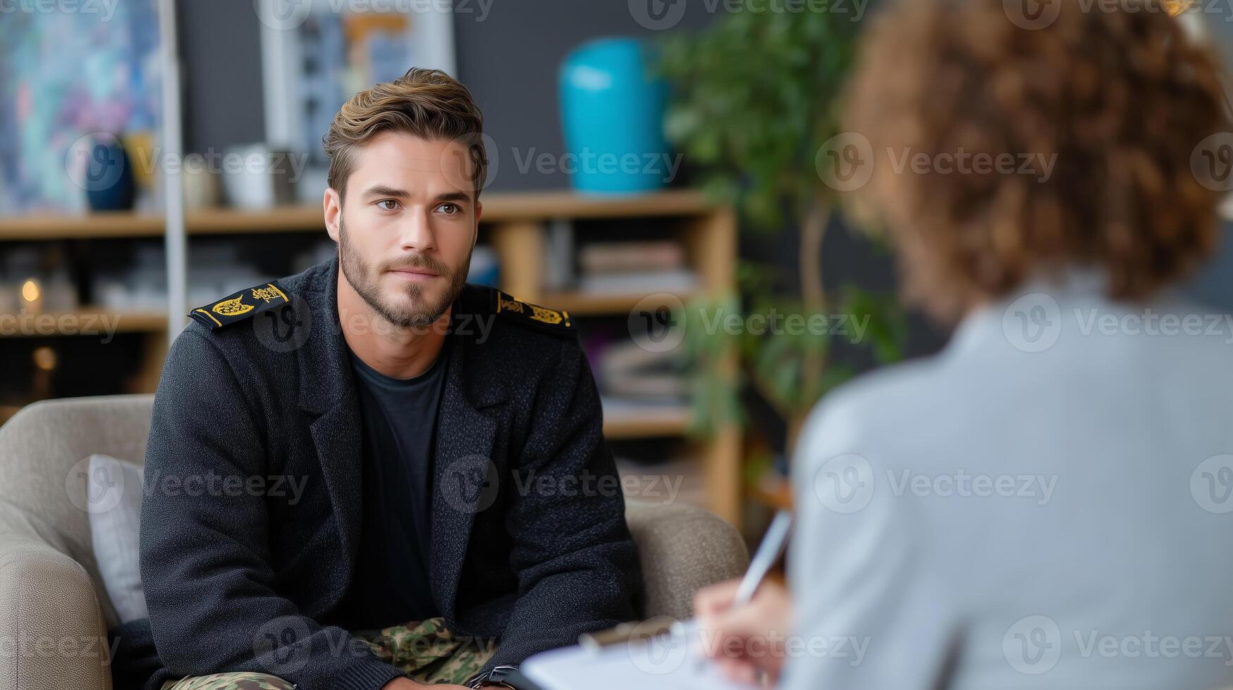 Military man engages in counseling session with therapist in modern office setting photo