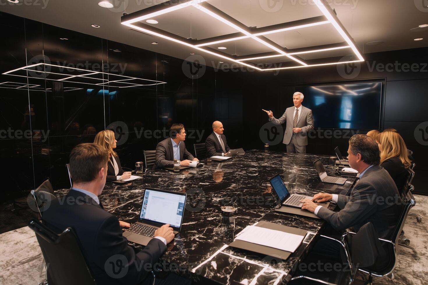 Business meeting in a modern conference room with professionals discussing strategies and ideas during the day photo