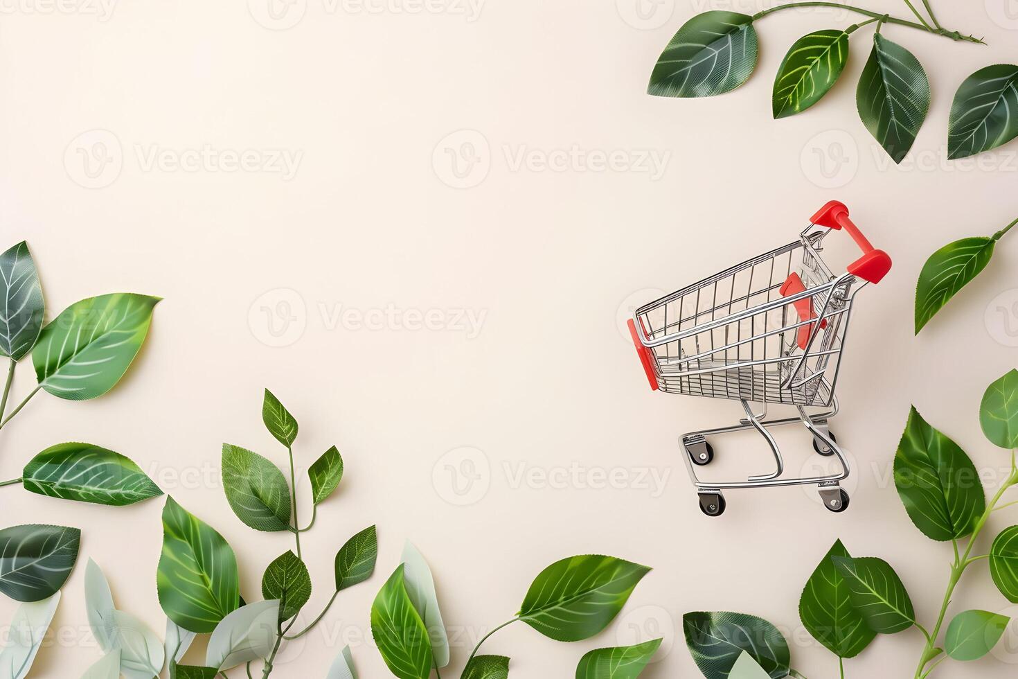 Shopping cart on white background with leaves and copy space for text photo