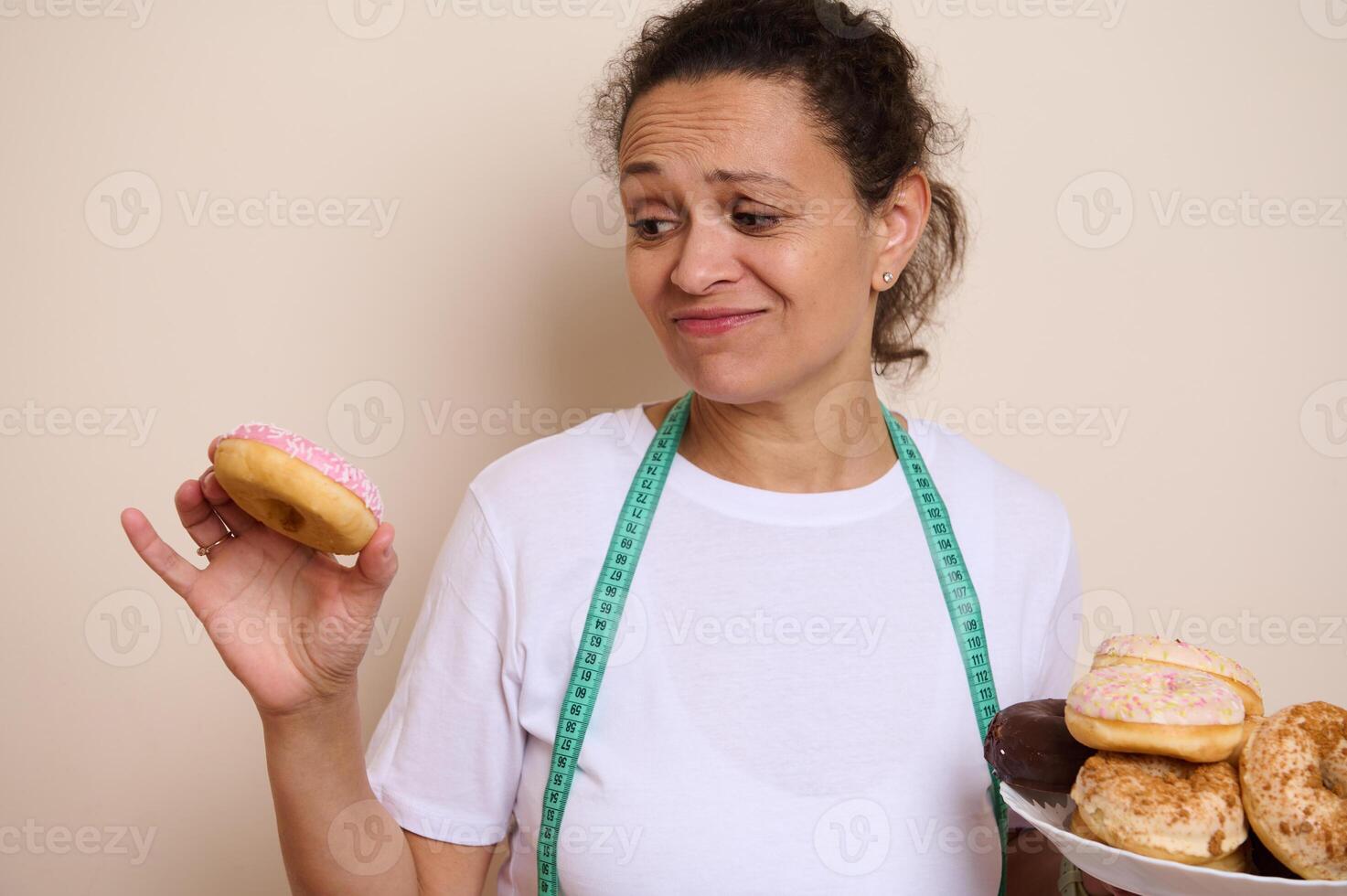Woman Debating Between Indulgent Doughnuts and Healthy Choices, Representing Wellness photo