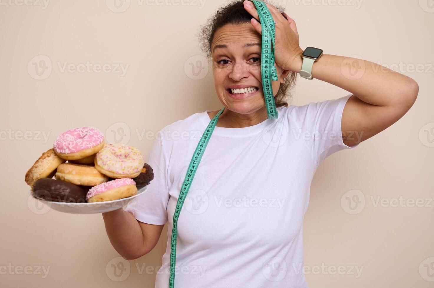 A Woman Chooses Between Sweet Doughnuts and Healthy Fruits for Wellness photo