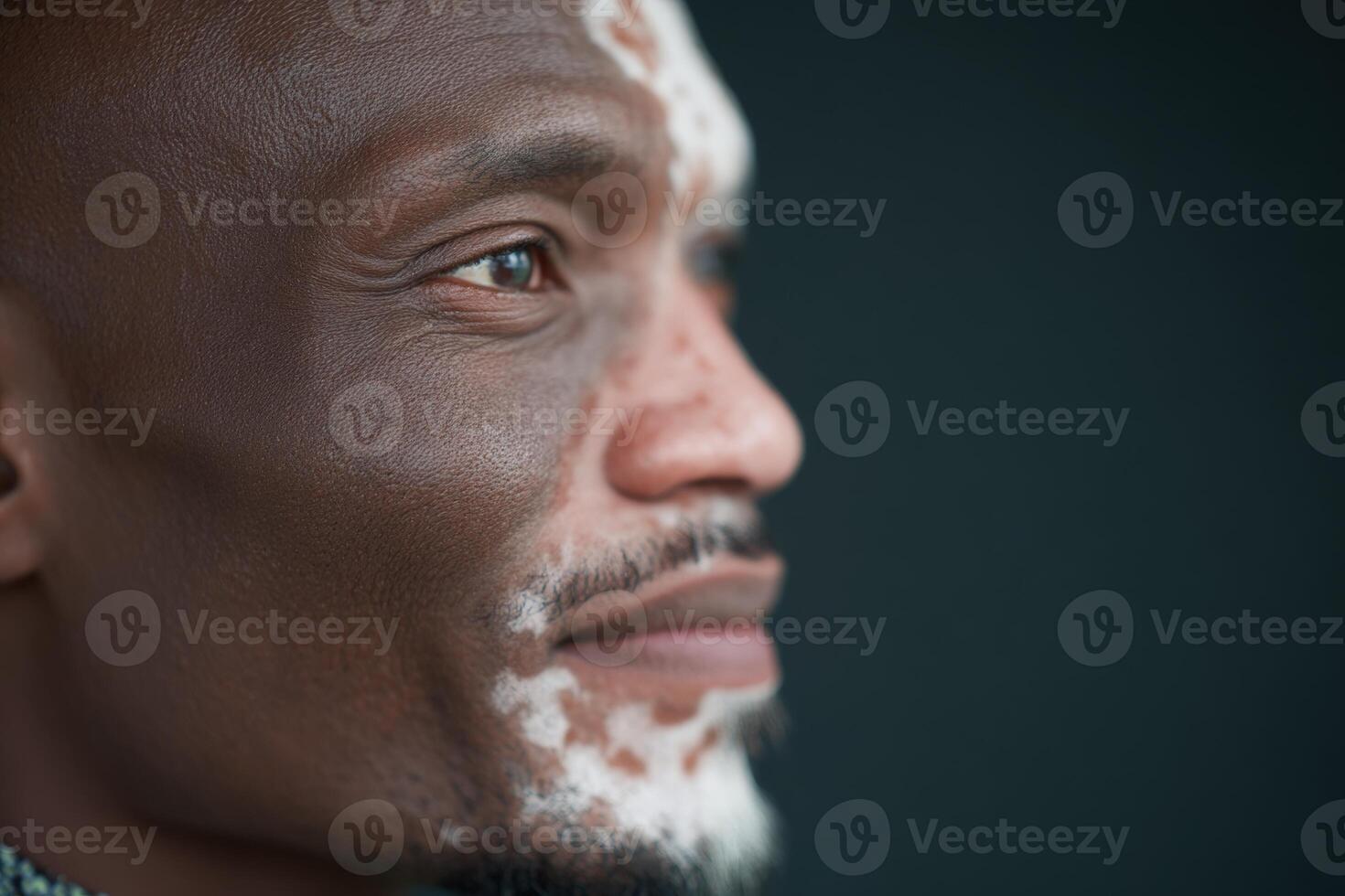 Portrait of a man with facial patterns expressing calmness and confidence in a soft light photo