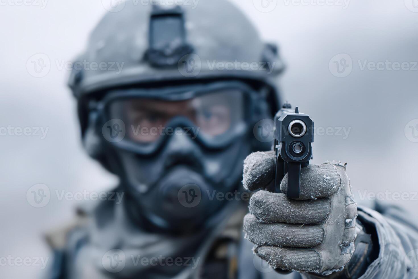 Soldier in tactical gear aims sidearm during winter training exercise in a remote location photo
