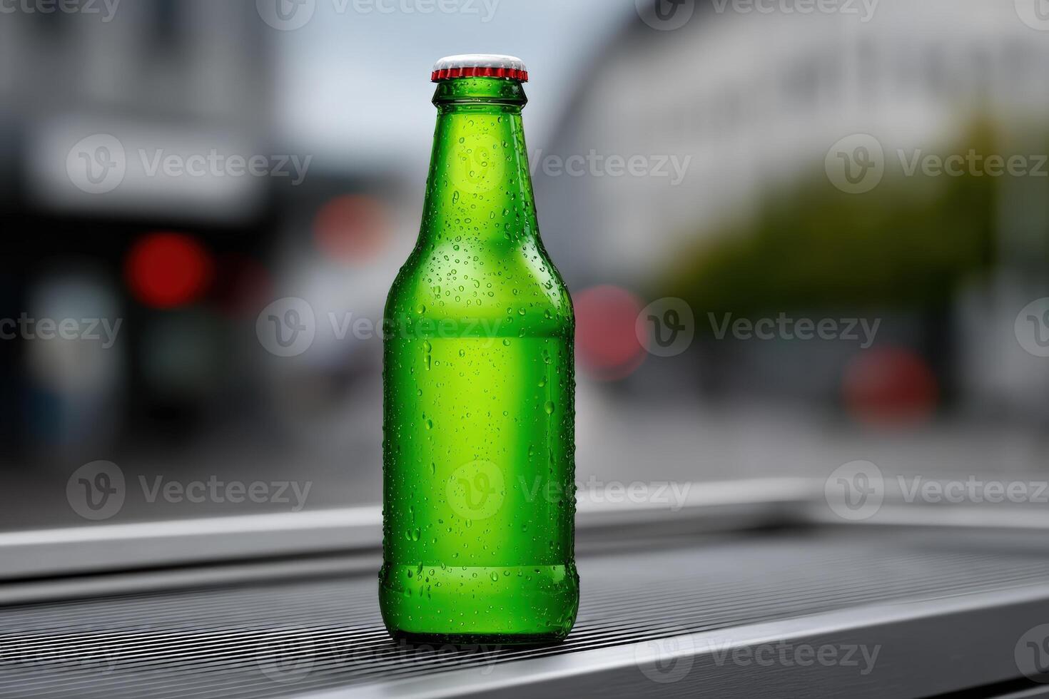 Condensation forms on a vibrant green glass bottle placed on a flat surface in a city setting photo