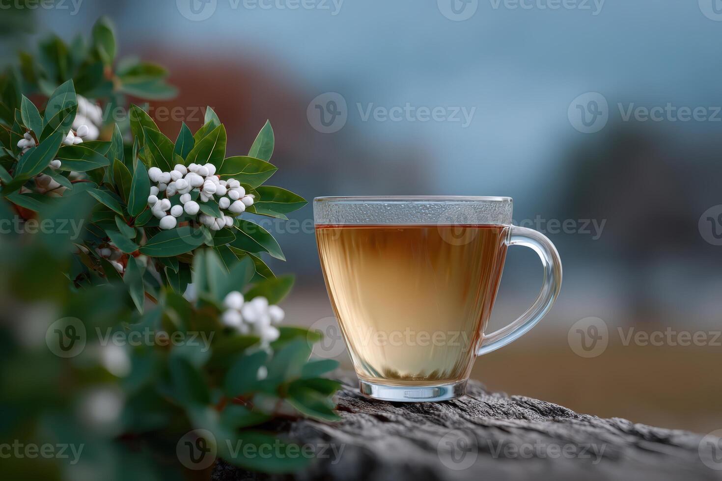 Tea with microplastic fragments floating on the surface in a serene outdoor setting photo