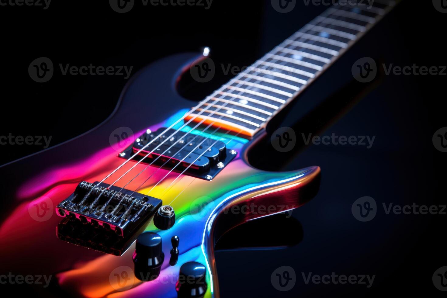 Guitar neck illuminated with vibrant multicolor LED lights in a dark setting photo