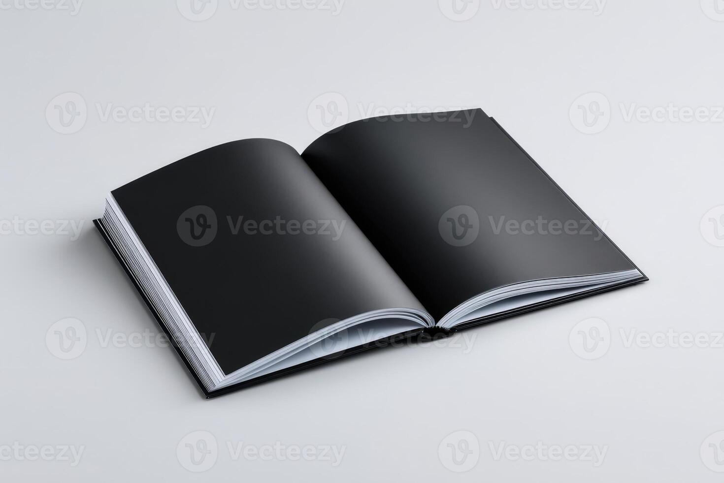 Open book with blank black pages ready for creative expression and note-taking photo