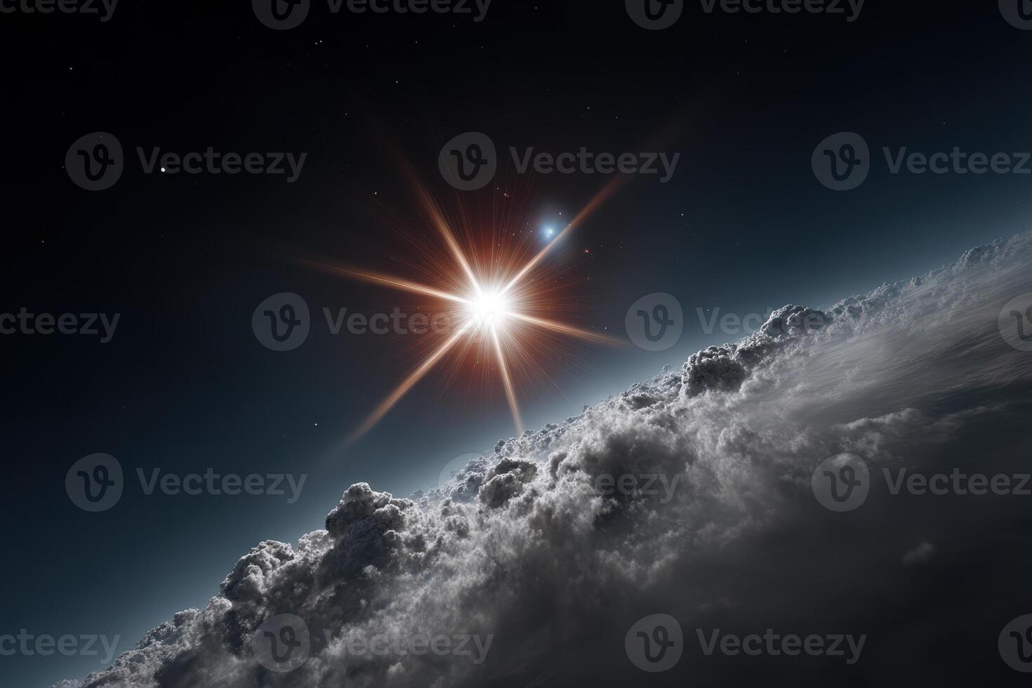 Spectacular view of a sun rising over a cloud-covered landscape in outer space photo