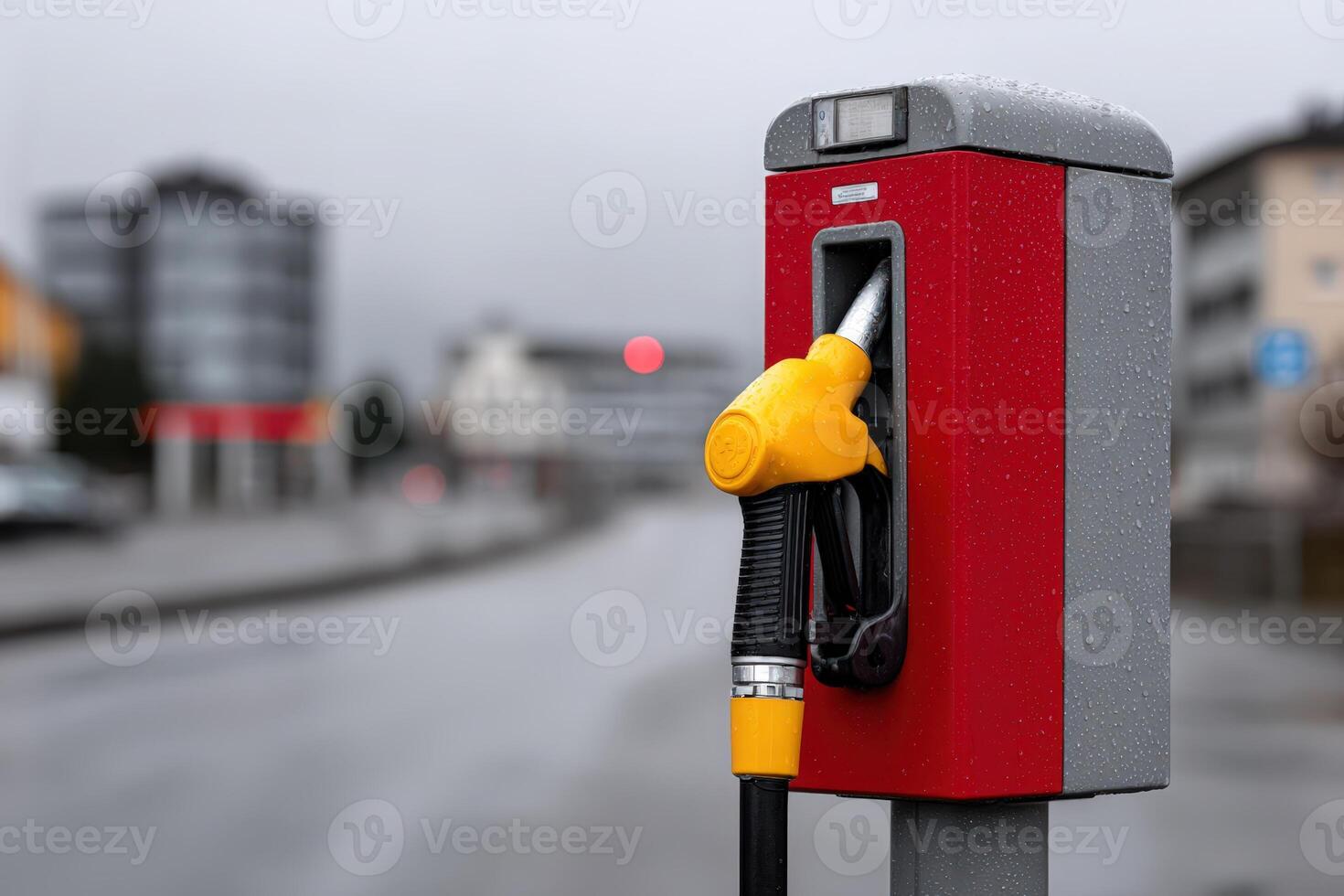 Realistic modern gasoline pump in red color with foggy surroundings on a quiet street photo