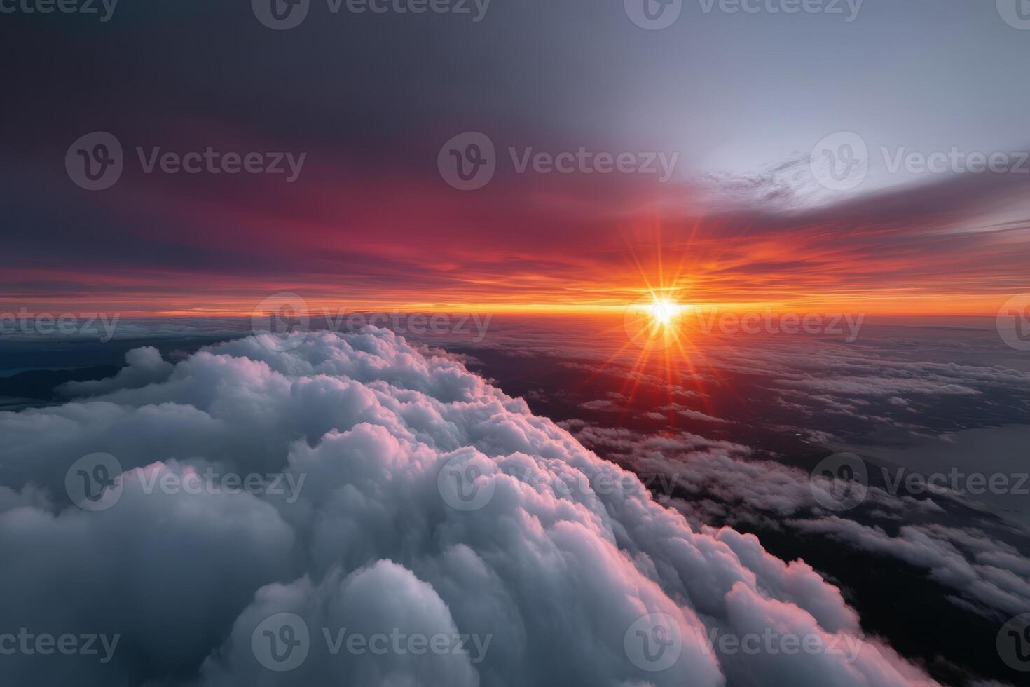 Swimming through clouds above a glowing sunset on a tranquil evening sky photo