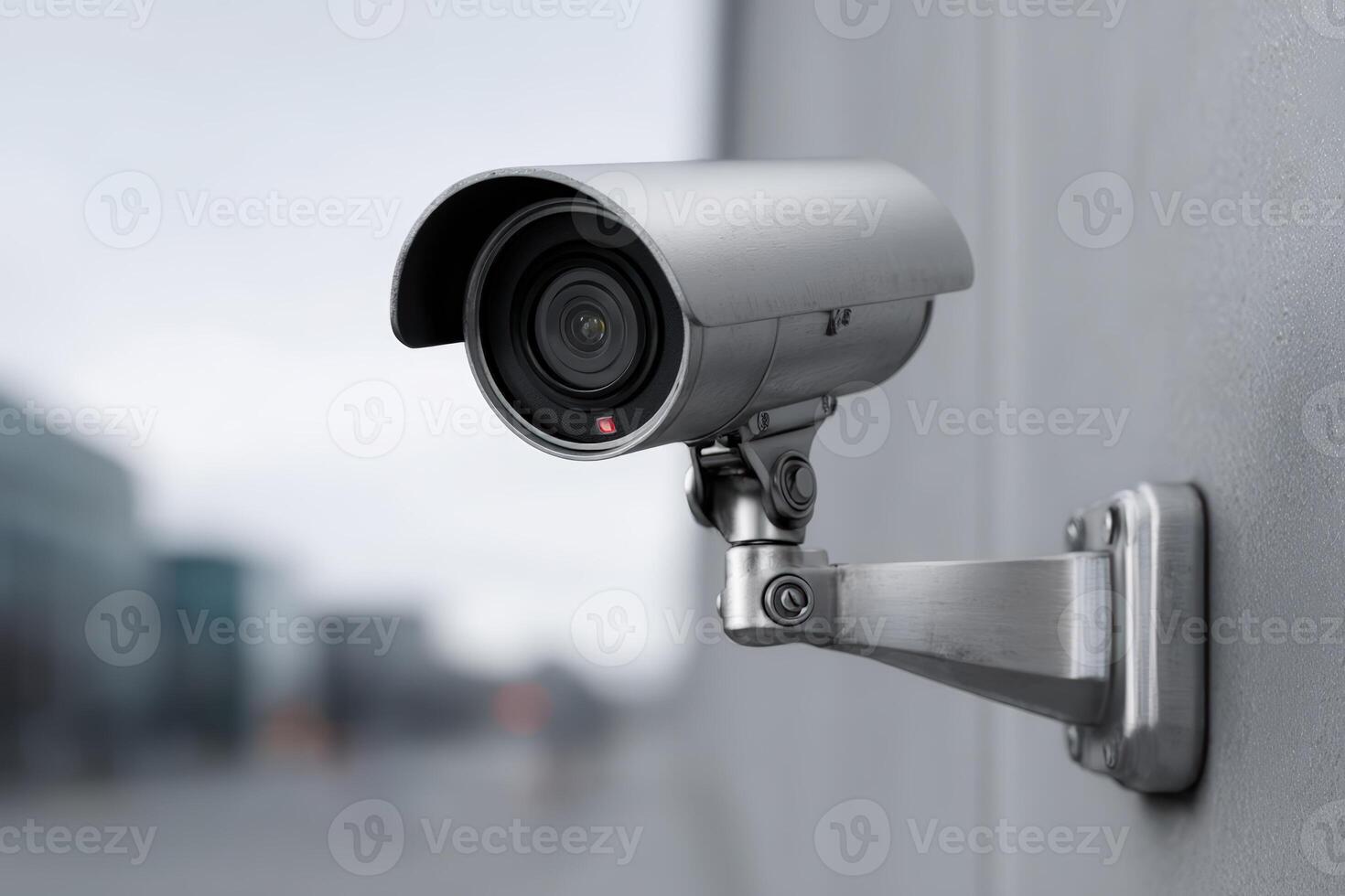 Close-up of a high-end surveillance camera mounted on a building wall in an urban setting photo