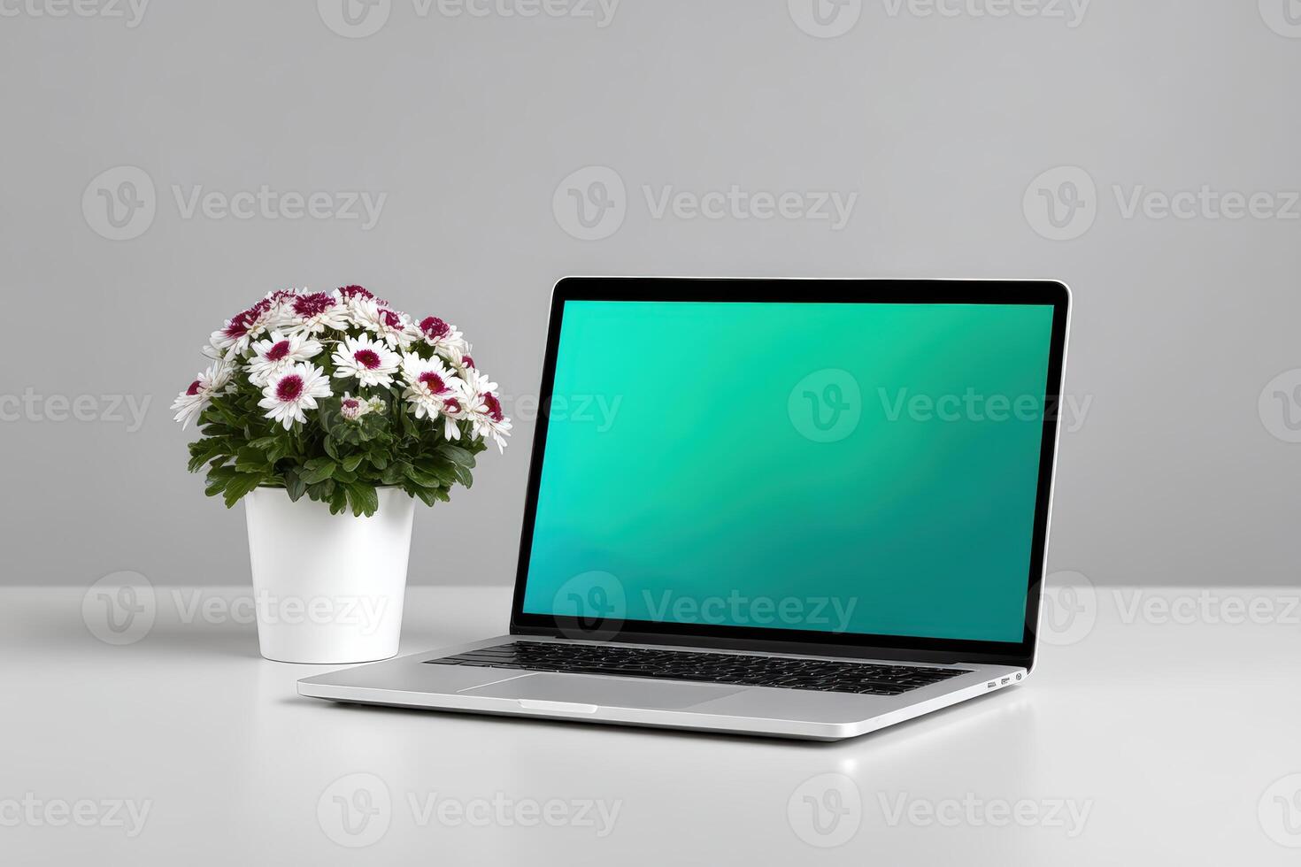 Laptop displaying AI interface on a white table with a potted plant photo