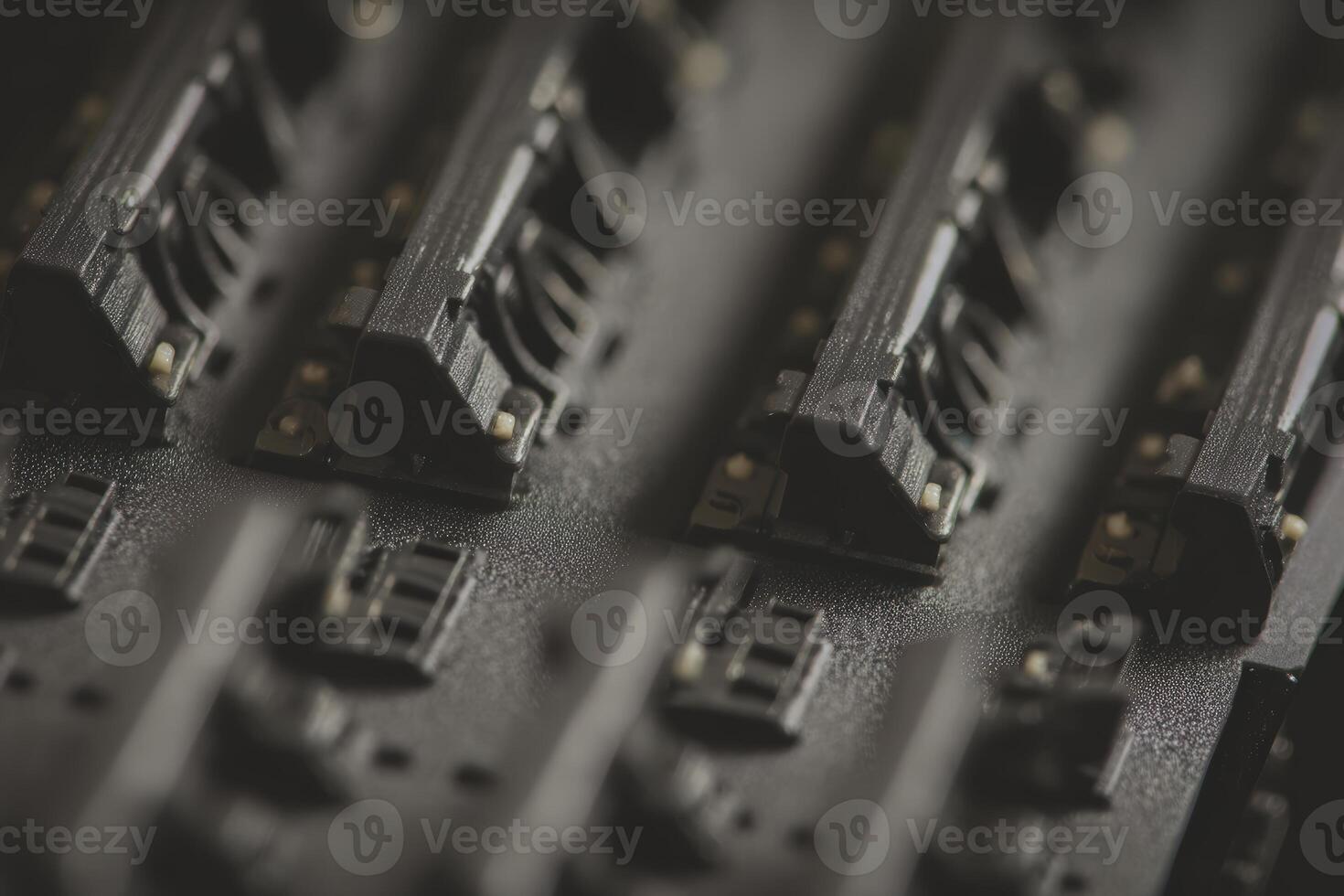 Angled patch panel connectors arranged in close proximity on a structured surface photo