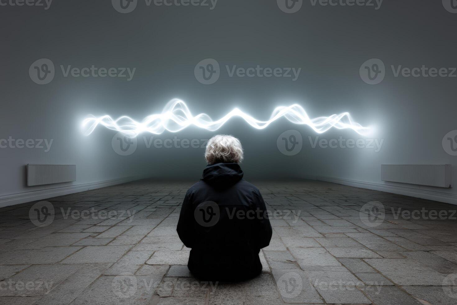 Artist sculpting emotions through visual light display in immersive gallery space photo
