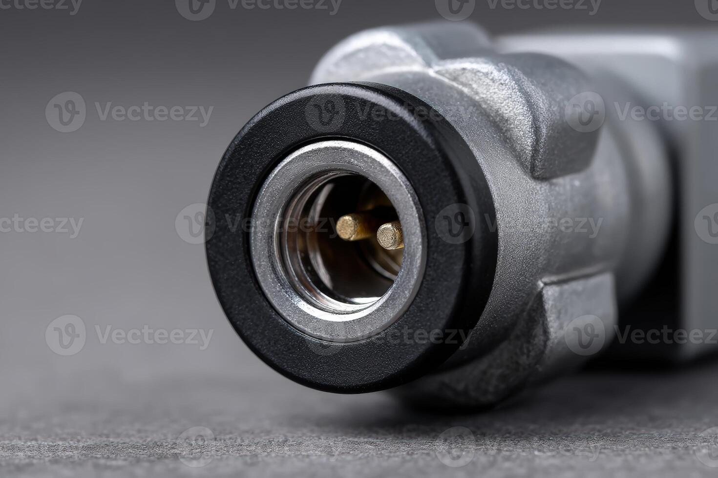 Power inlet on PDU featuring metallic screws and dual pin connection for electrical systems photo