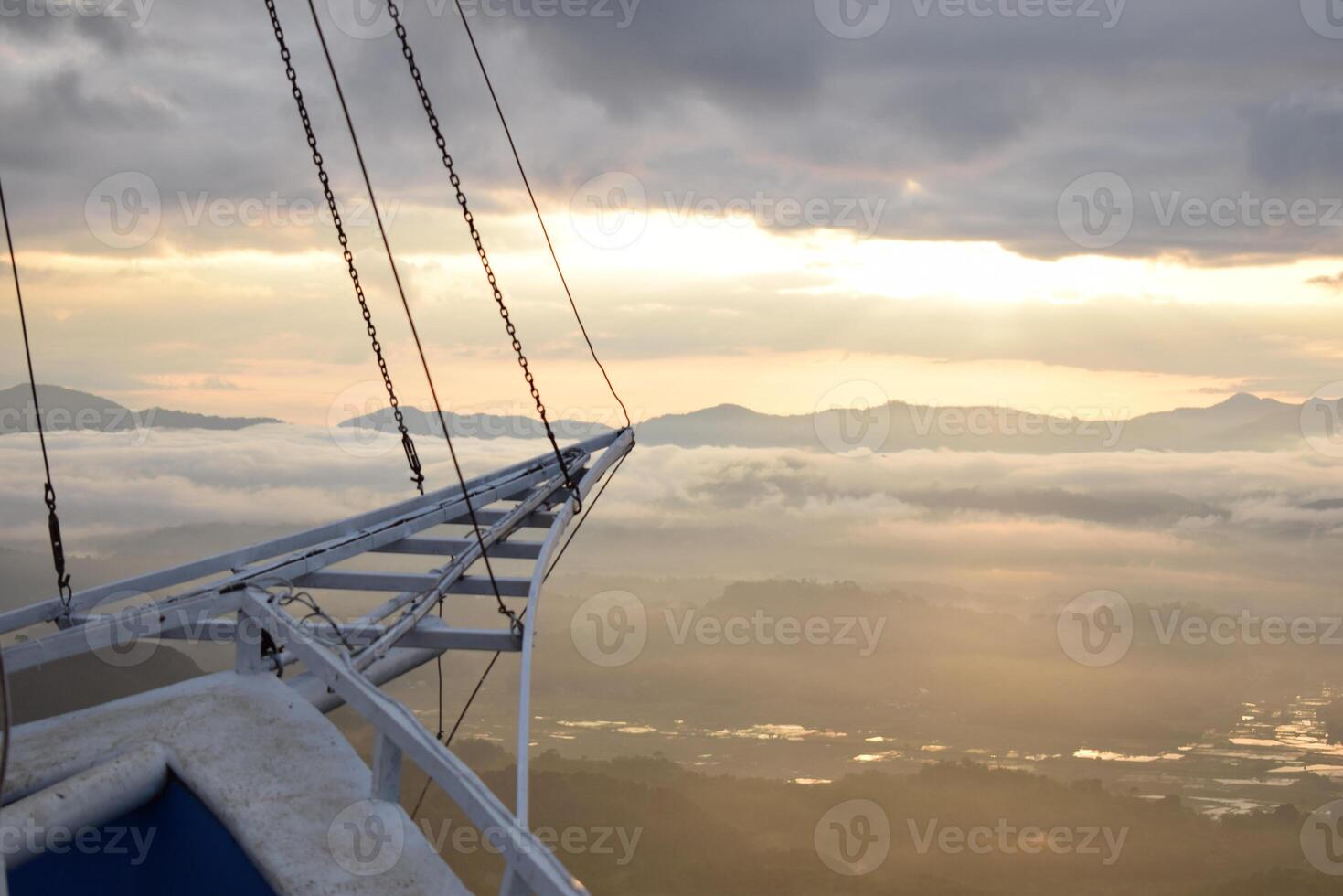 A metal ladder on a bridge photo