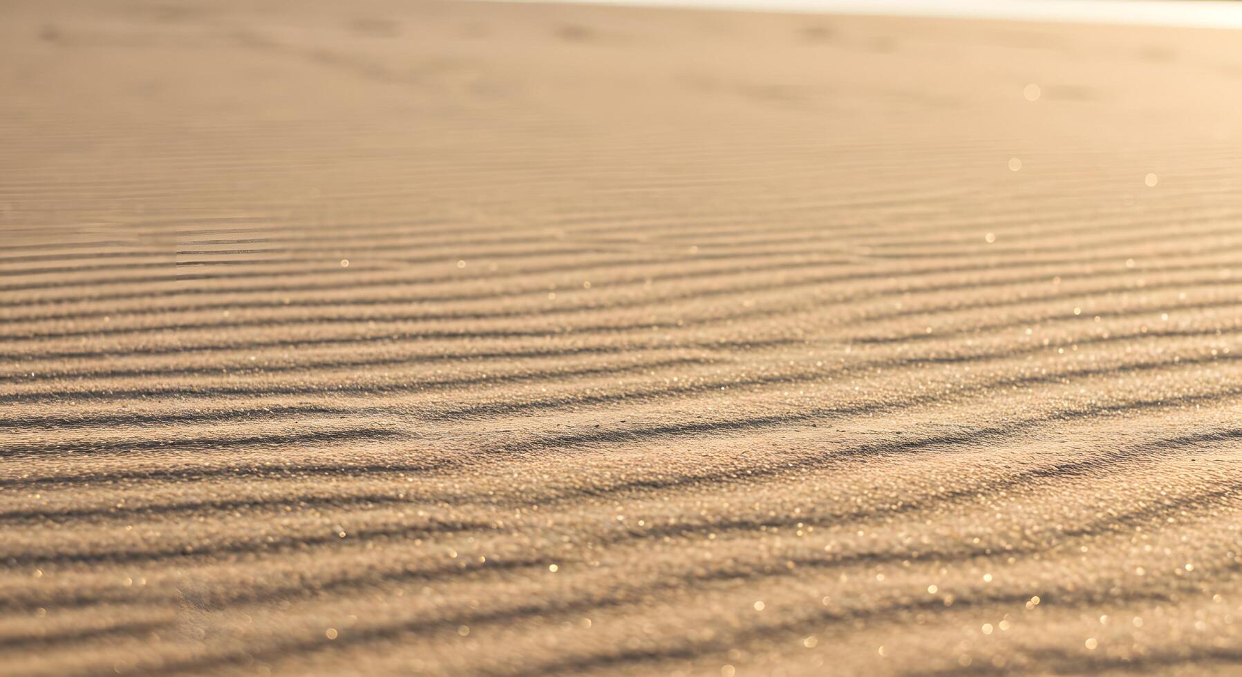 Wavy sand texture background capturing natural beach patterns, ideal for travel promotions, website headers, or summer-themed digital assets. photo