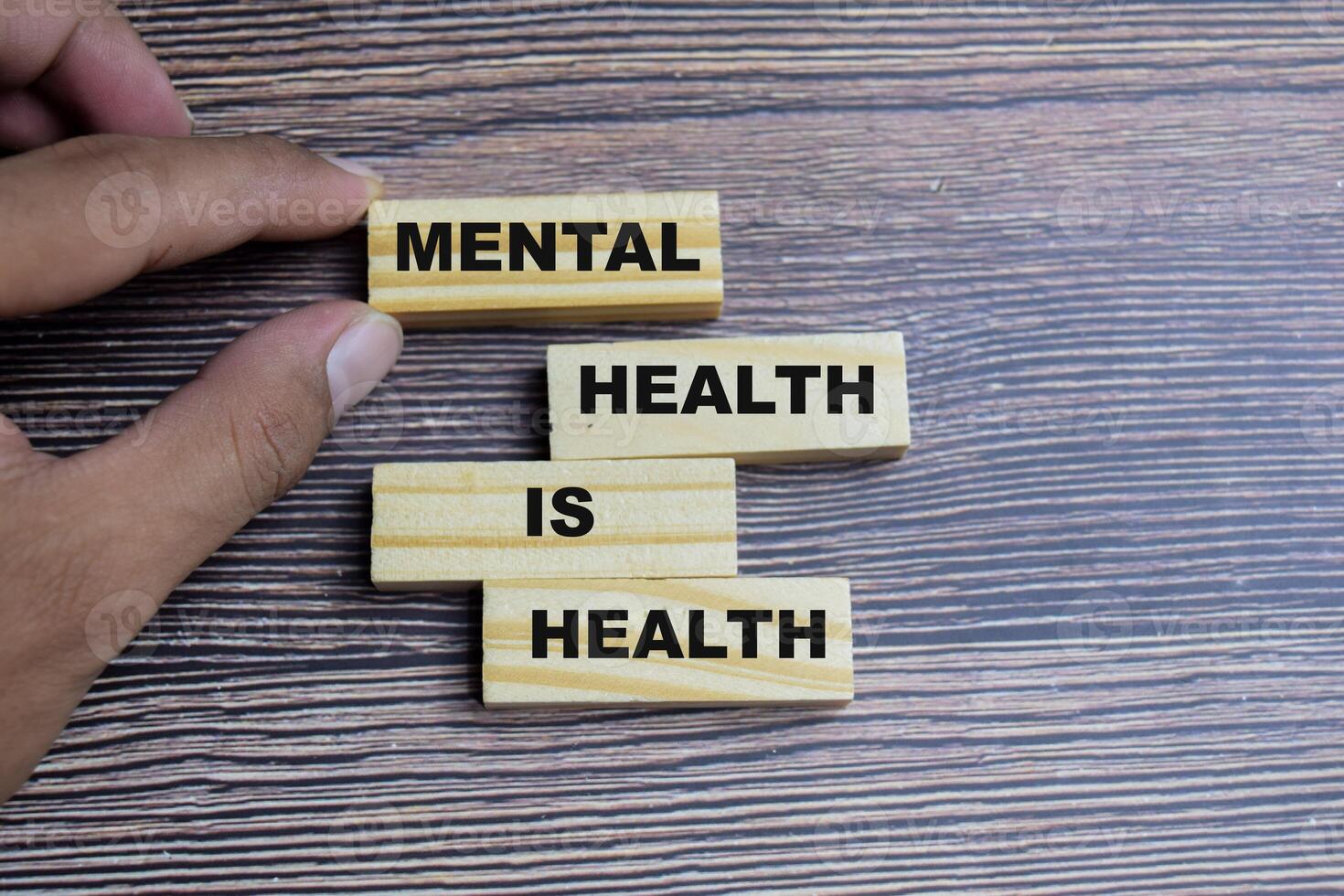Concept of mental health is health Symbol. Wooden block with words mental health is health photo