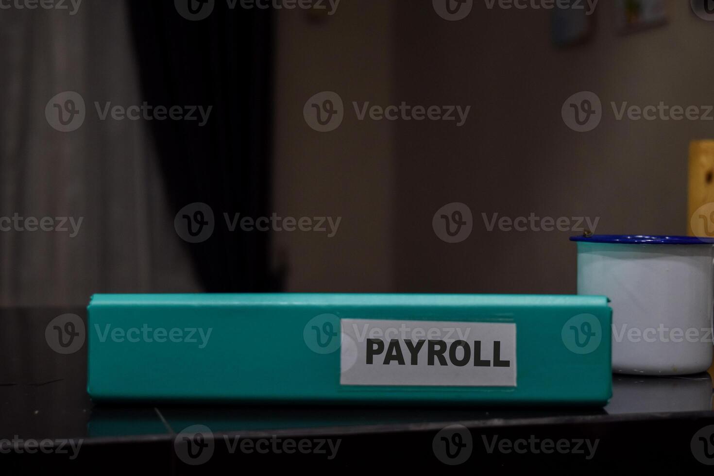 folders with the label Payroll, Business management concept photo
