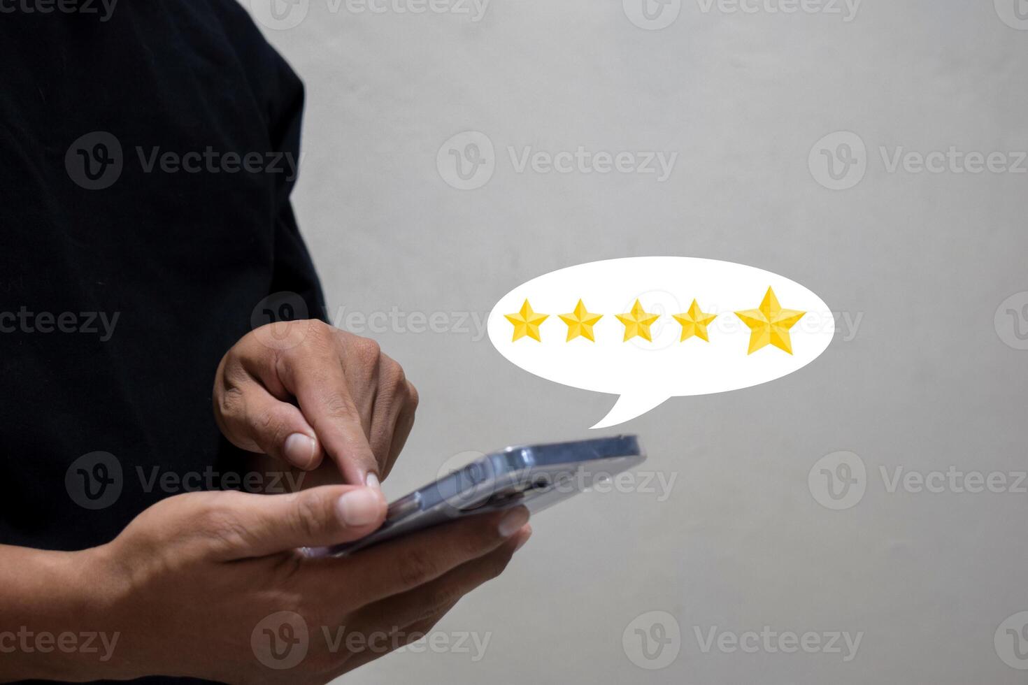 customer man hand pressing on smartphone screen with gold five star rating feedback icon and giving best score point to review the service. photo