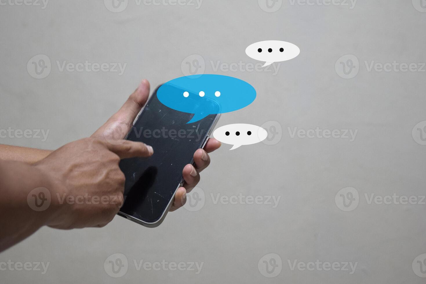 man hand using smartphone typing, chatting conversation working home in chat box pop up. social media marketing technology concept photo