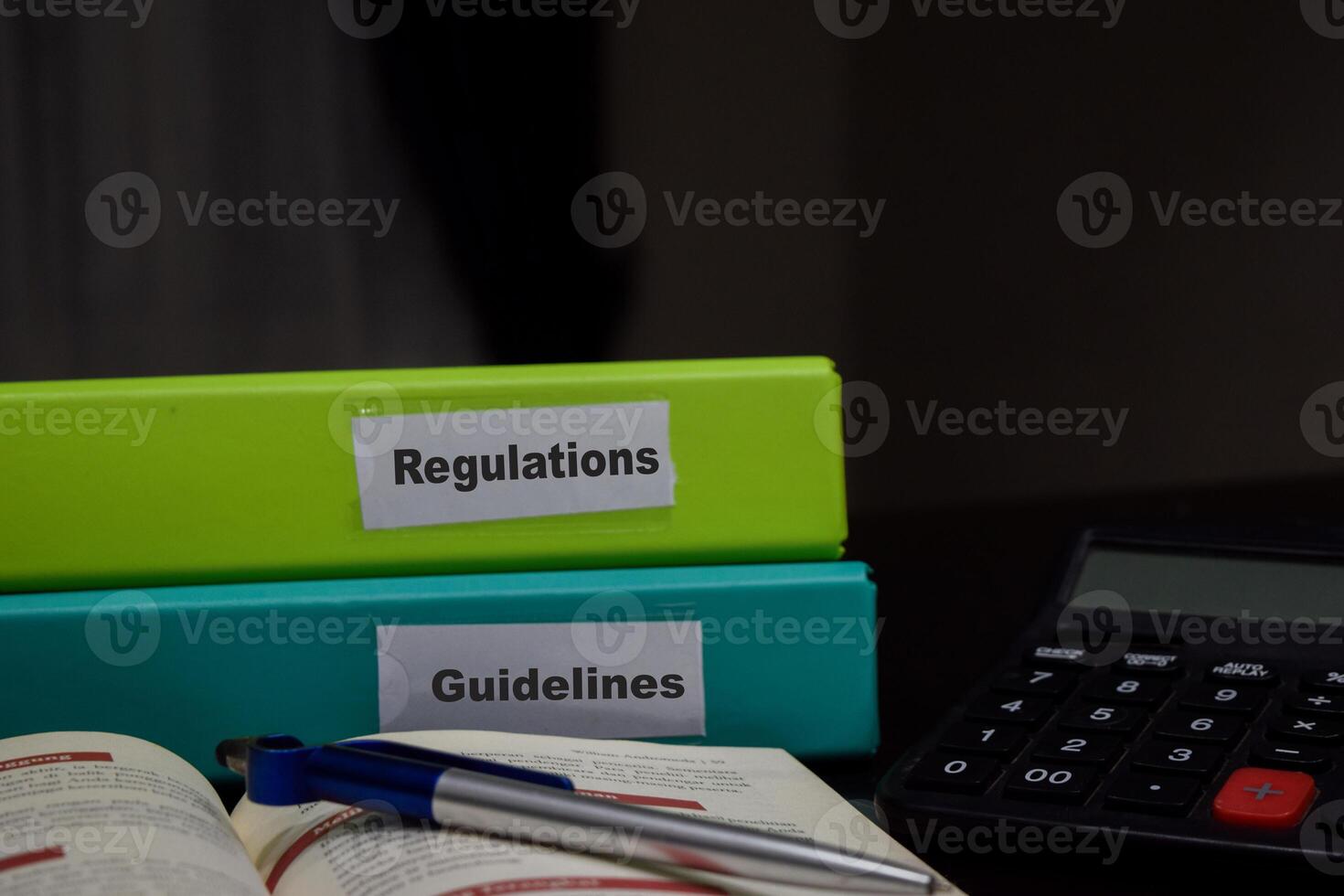 folders with the label Regulations and Guidelines. Business management concept photo
