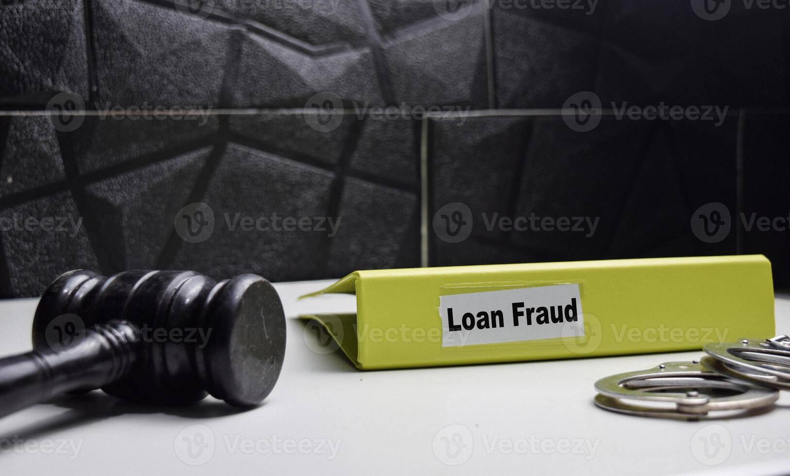 folders with labels loan fraud, financial and crime concept photo