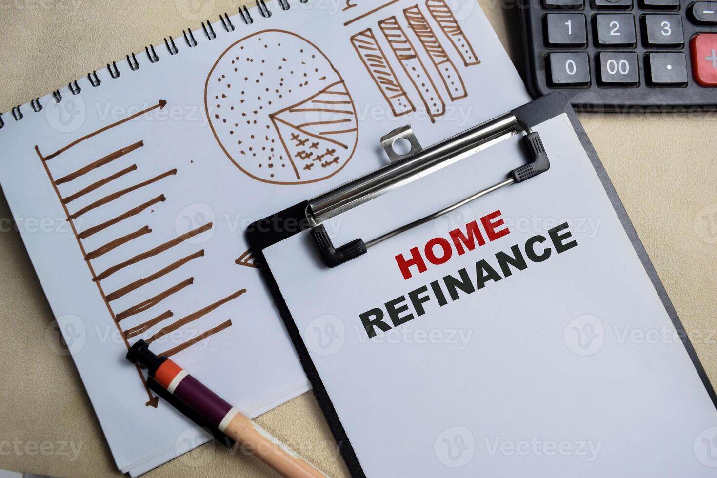 Concept of Home refinance write on clipboard isolated on Wooden Table. photo