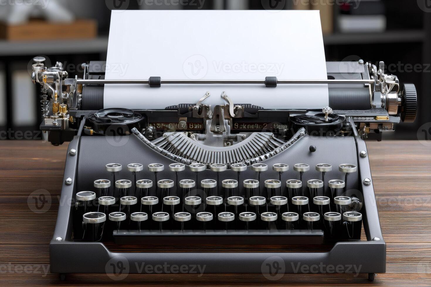 Vintage typewriter standing on wooden desk with blank paper displaying writing potential photo