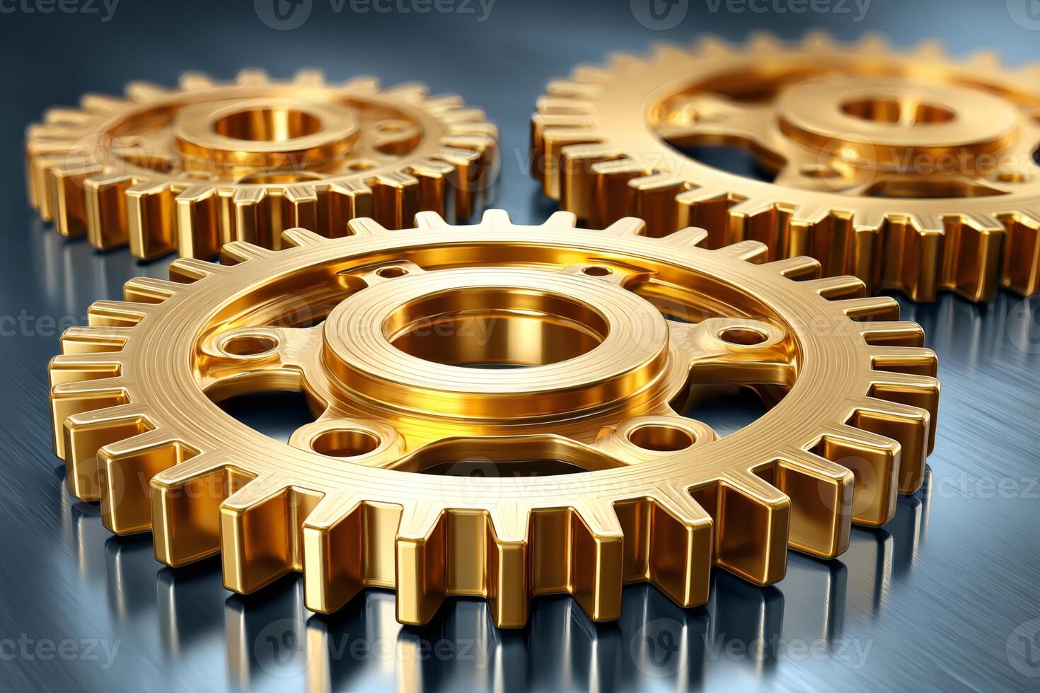 Golden gears rotating smoothly on reflective surface photo