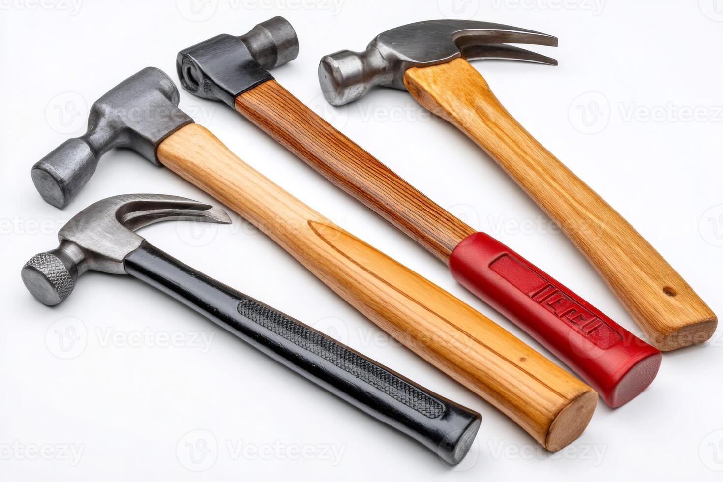 Four hammers lying on a white background photo