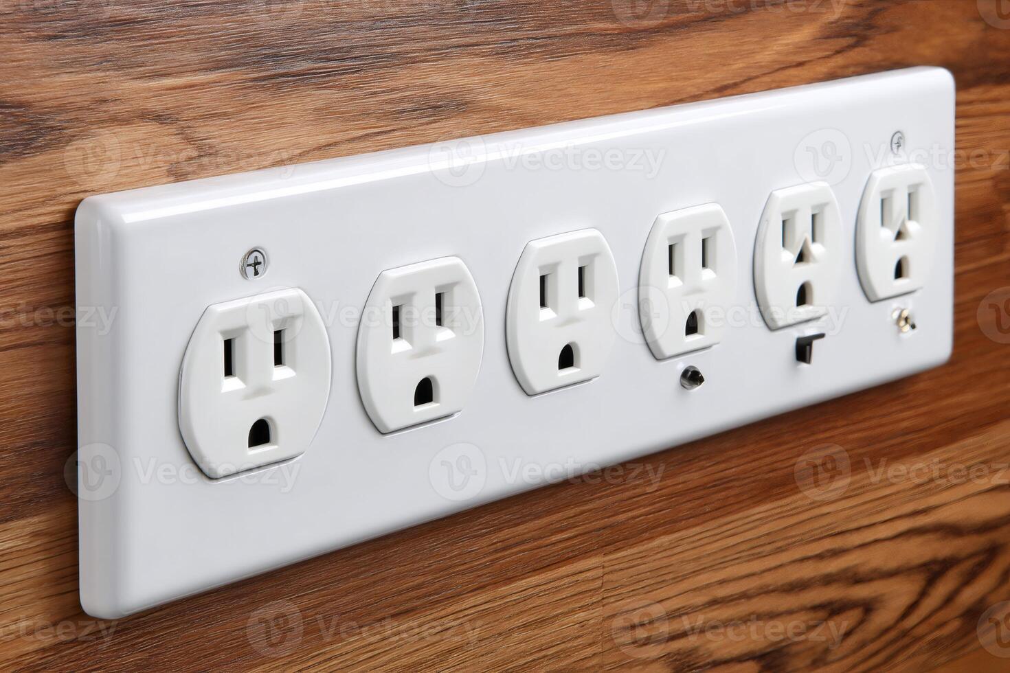 White multiple socket power outlet on wooden wall providing electricity photo