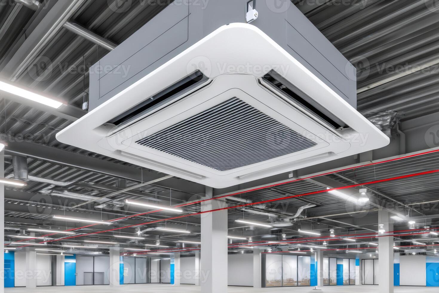 Modern air conditioner hanging from ceiling in empty office space photo