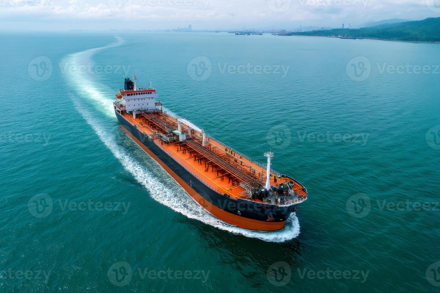 Large crude oil tanker ship sailing in open ocean on sunny day photo