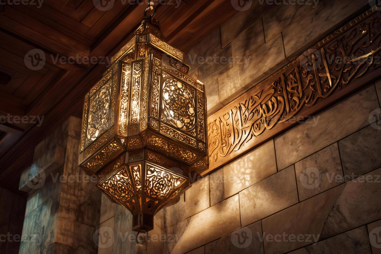 Ornate lantern illuminating arabic calligraphy in mosque photo
