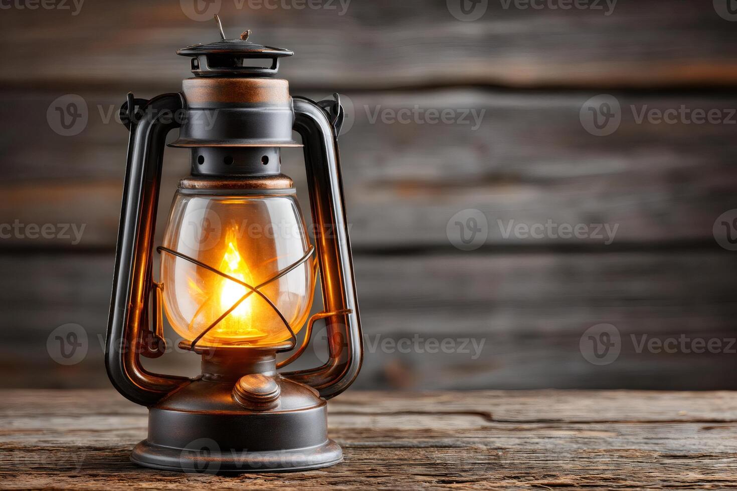 Burning kerosene lamp illuminating rustic wooden table photo