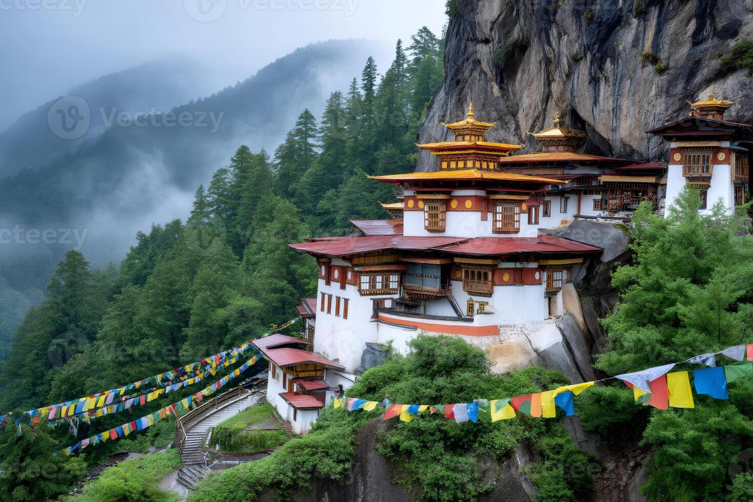 Taktsang monastery, bhutan, clinging to a cliff overlooking a misty valley, adorned with colorful prayer flags photo